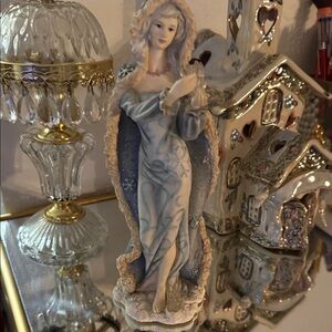 Elegant Blue and Cream Figurine